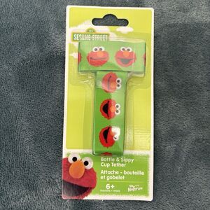 Petite Creations No Throw Bottle And Sippy Cup Tether Elmo Green